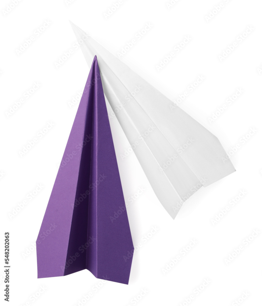 Naklejka premium Handmade colorful paper planes isolated on white, top view