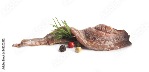 Delicious anchovy fillets, dill and spices on white background