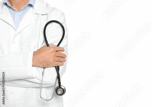 Doctor with stethoscope on white background, closeup