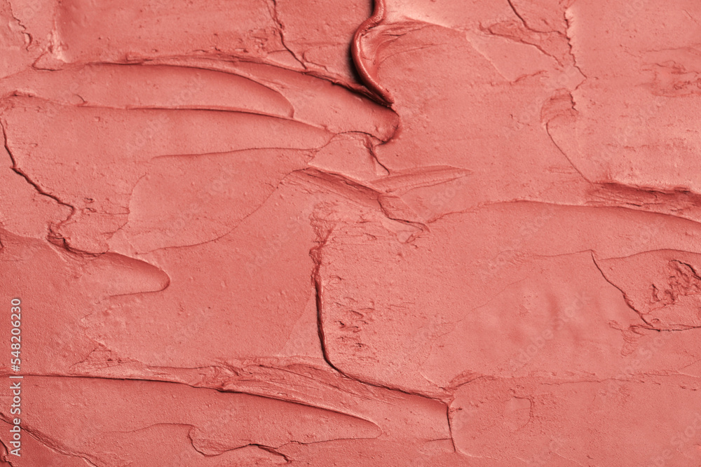Naklejka premium Texture of beautiful lipstick as background, top view