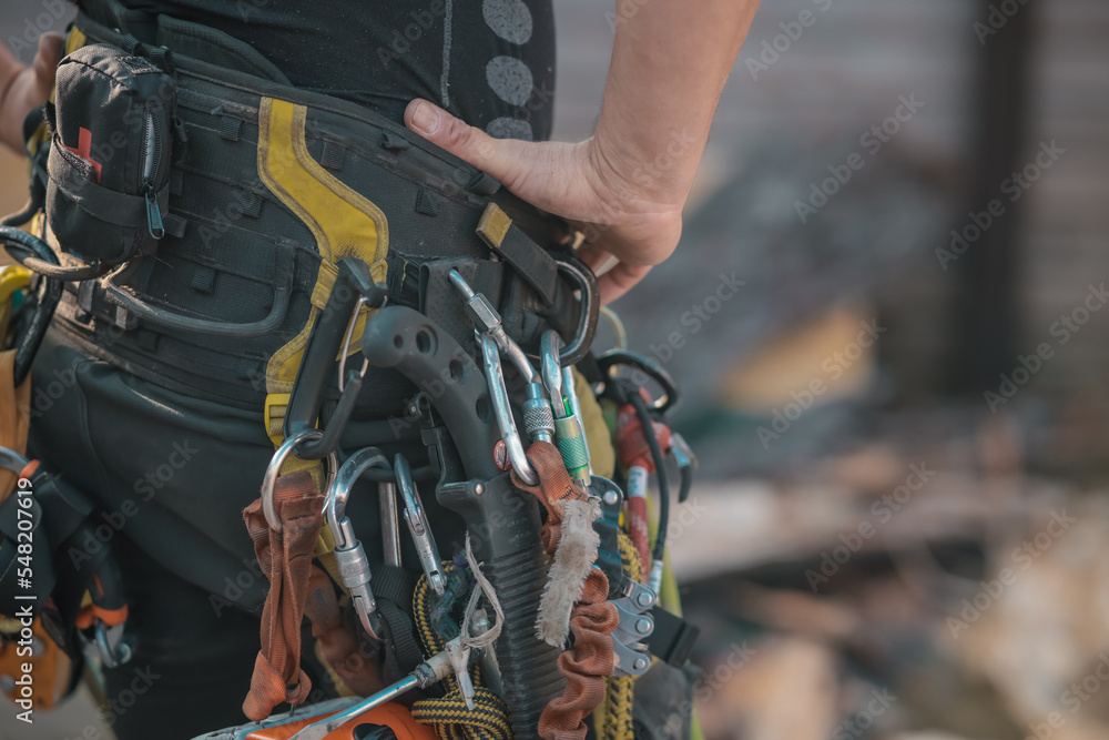 Different safety equipment for arborist or arborists such as ropes, anchors, straps and so on. Detail of arborist equipment. Different safety equipment for arborist or arborists such as ropes, anchors, straps and so on. Detail of arborist equipment.