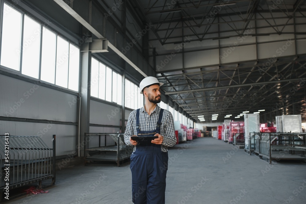 young worker in warehouse background young worker in warehouse background