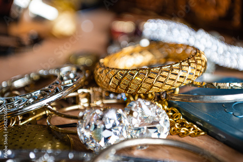closeup of beautiful costume jewelry, earrings, beads, bracelets and rings