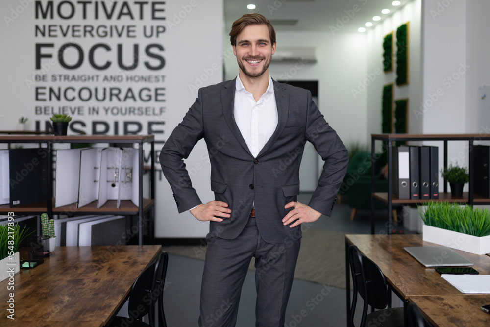 portrait of a successful and self-satisfied leader standing in the office portrait of a successful and self-satisfied leader standing in the office