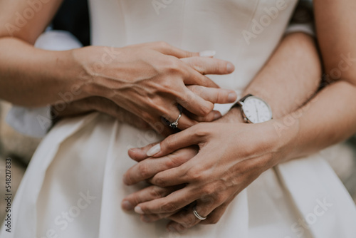Fototapeta bride and groom hands