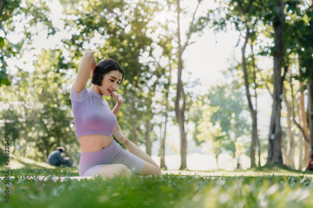 Young attractive woman doing yoga.