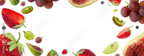 Fototapeta Naklejka Na Ścianę i Meble -  Fruits isolated on white background, round frame made of different falling fruits and berries, with copy space