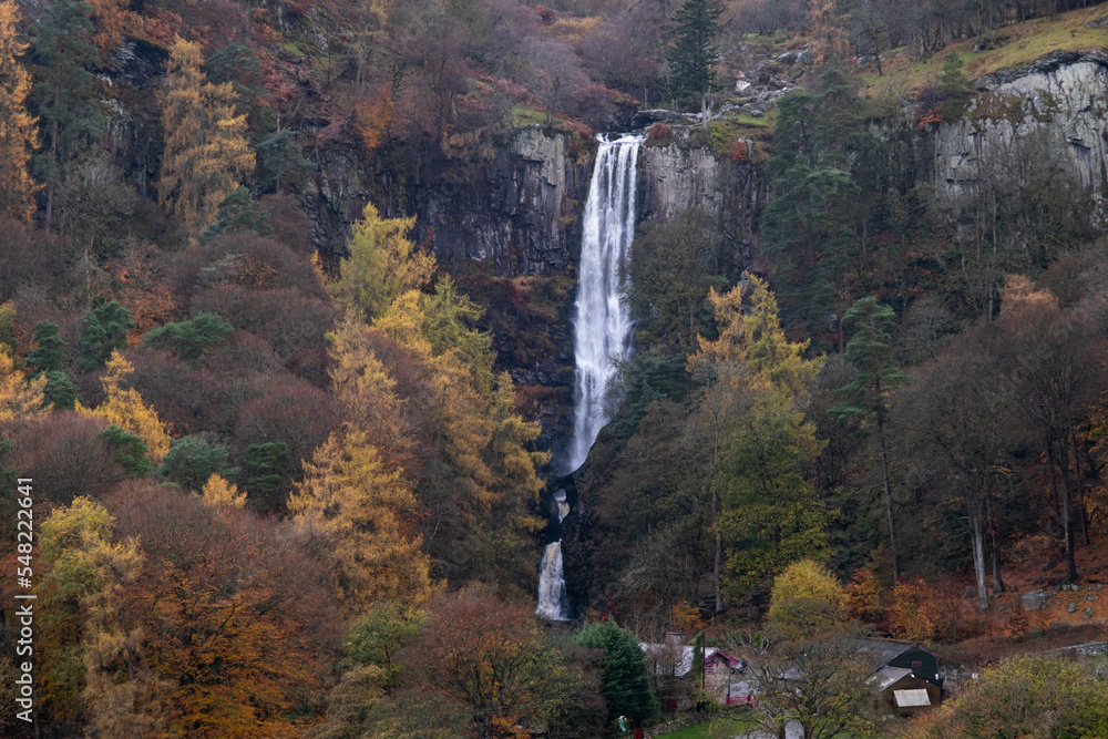 Pistyll Rhaeadr waterfall, Powys, the highest waterfall in Wales with some autumn colours in the trees.