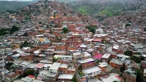 Aerial view of famous favelas of Caracas, Venezuela. Slums in poor residential district on the hills. The most dangerous cities in the world photo