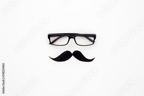 Black glasses with a mustache. Male symbols concept
