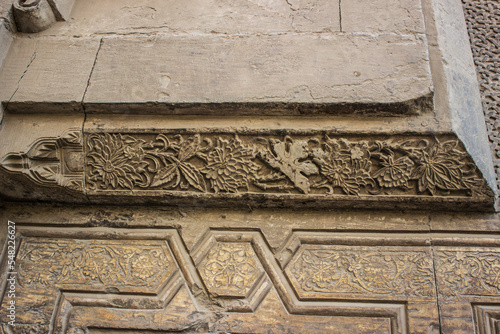 Floral Ornaments patterns carved into the exterior wall of Sultan Hasan Mosque, Cairo, Egypt