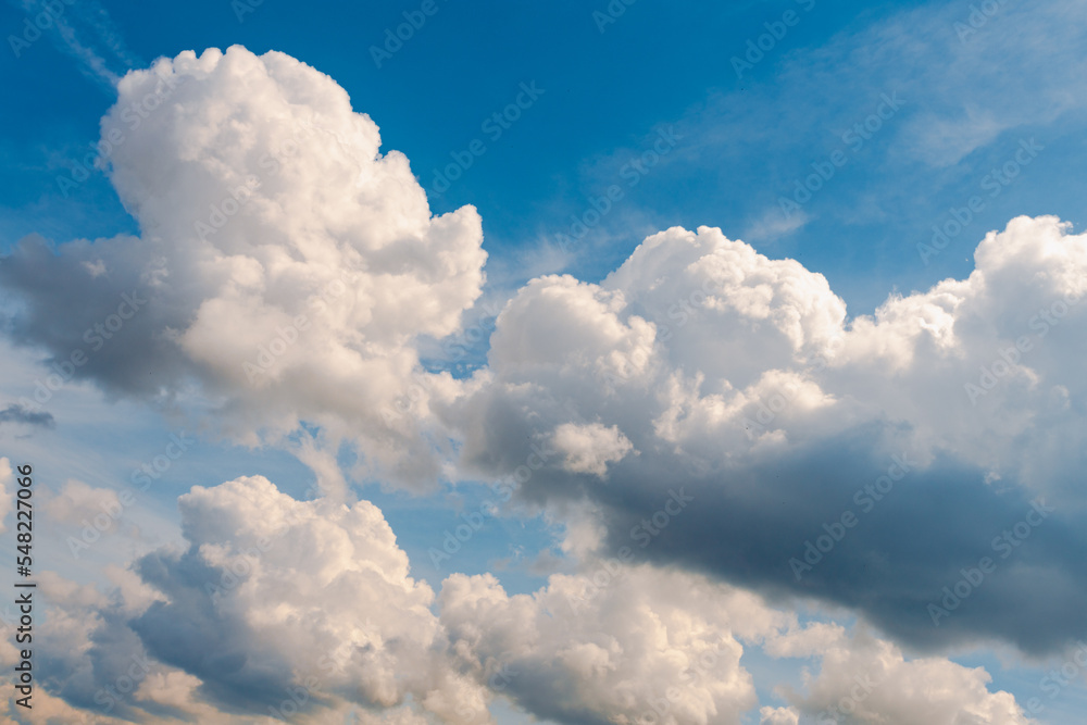 White, Fluffy Clouds In Blue Sky. Background From Clouds. White, Fluffy Clouds In Blue Sky. Background From Clouds.