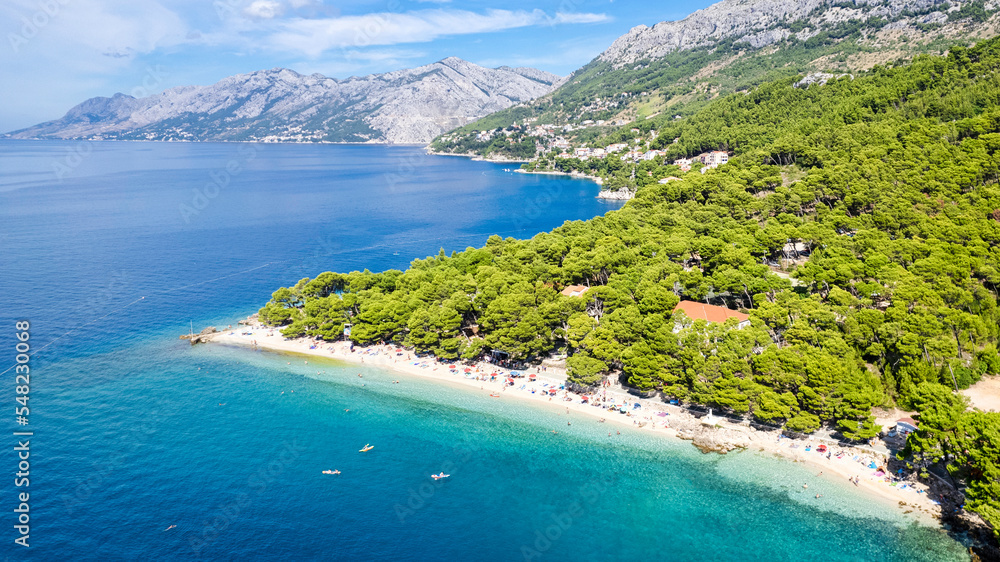 Aerial view of Brela beach and waterfront on Makarska riviera, Dalmatia region of Croatia