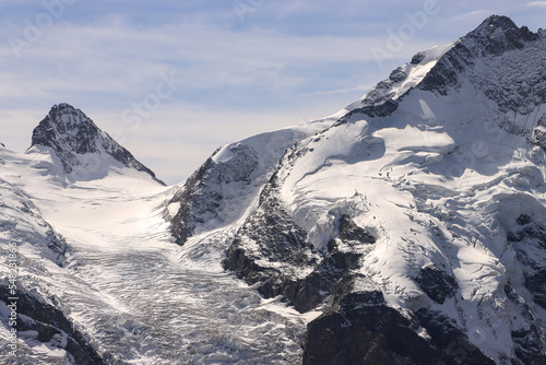 Riesen der Ostalpen im Spätsommer 2022; Crast' Agüzza  (3854m) und Piz Bernina (4049m) vom Munt Pers gesehen photo