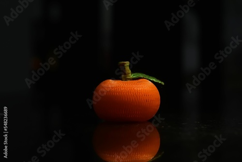 Pumpkin figure in dark background