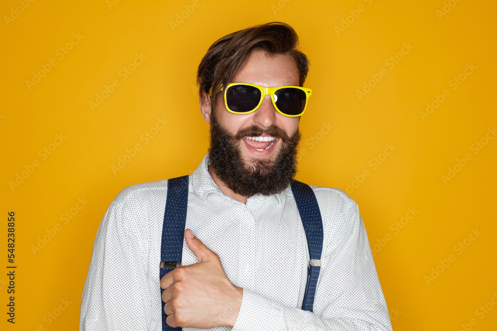 Fototapeta premium Exited hipster gesturing V sign