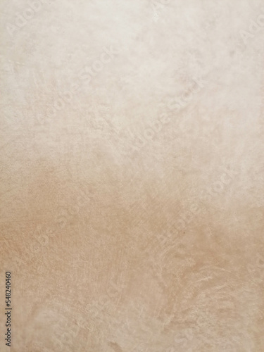 Fondo con detalle y textura de superficie con estucado suave y degradado de tonos marrones