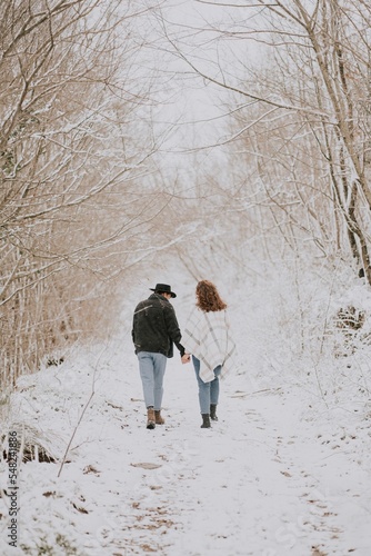couple walking in winter, snow