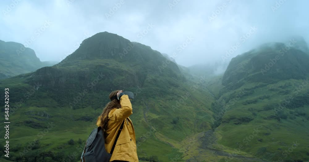 Hiking, metaverse or vr headset with woman in mountain, nature, virtual 3d technology outdoor on adventure. Virtual reality, ai and female on hike, travel and backpack through forest with metaverse Hiking, metaverse or vr headset with woman in mountain, nature, virtual 3d technology outdoor on adventure. Virtual reality, ai and female on hike, travel and backpack through forest with metaverse