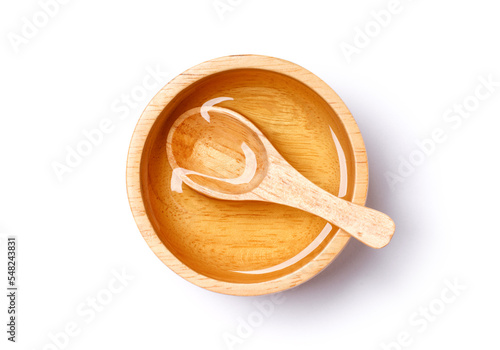 Obraz na plátne Sugar syrup in wooden bowl isolated on white background with clipping path