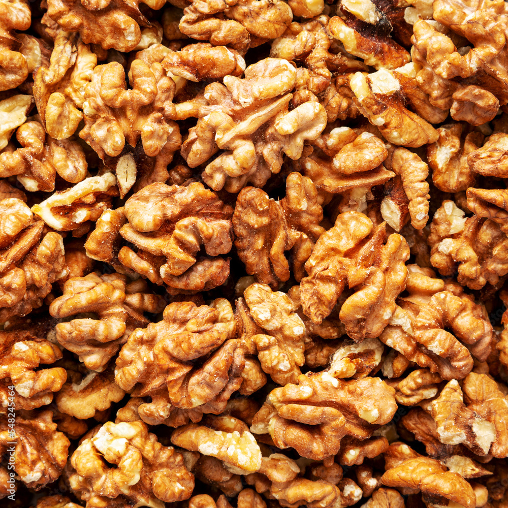 Raw Organic Walnuts background, top view. Flat lay, overhead, from above. Raw Organic Walnuts background, top view. Flat lay, overhead, from above.