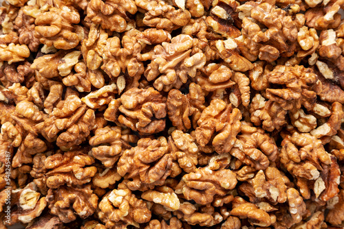 Raw Organic Walnuts background, top view. Flat lay, overhead, from above.