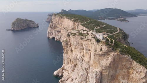 Drone footage of Capo Caccia Lighthouse in Alghero, Sardinia, Italy photo