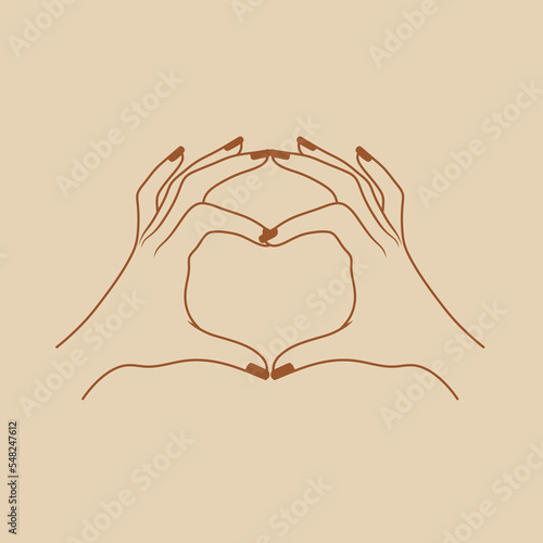 Hands show a heart. Women s hands on a beige background. Symbol of love.
