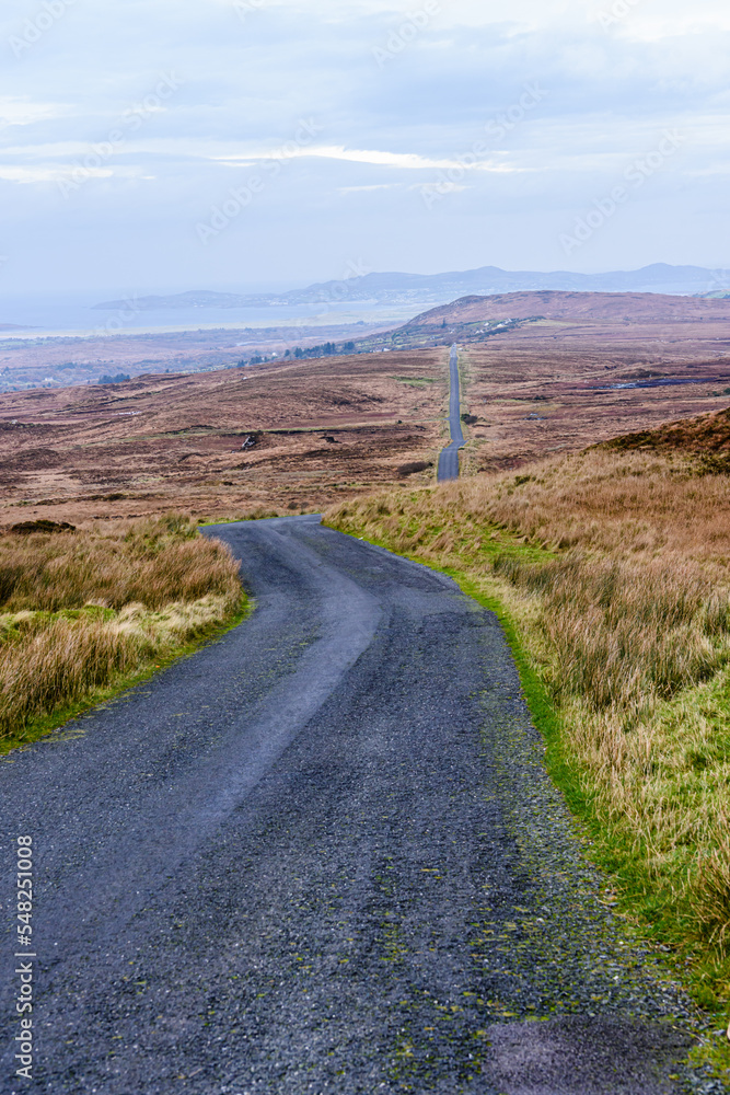 Long, straight road over the mountains in County Donegal, Republic of Ireland