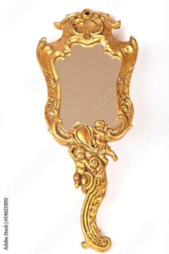 golden antique hand mirror