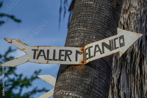 taller mecanico road sign in mexico baja california photo