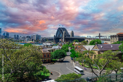 Sydney Harbour viewed from Observatory Park and overlooking Sydney Rocks area and North Sydney with colourful skies NSW Australia photo