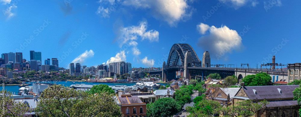 Sydney Harbour viewed from Observatory Park and overlooking Sydney Rocks area and North Sydney with colourful skies NSW Australia