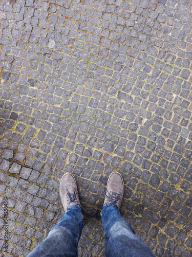 feet on the pavement