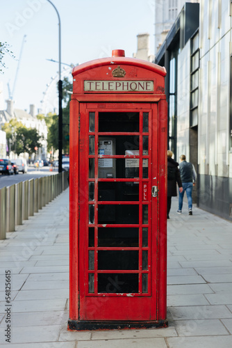 Old red telephone box in London, England