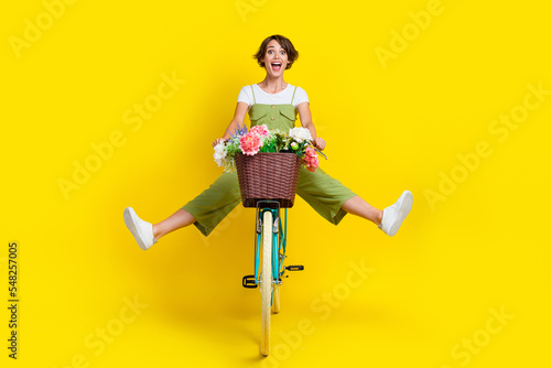 Fotomurale Full size photo of nice young girl driving cycle fast hurry scream energetic wea