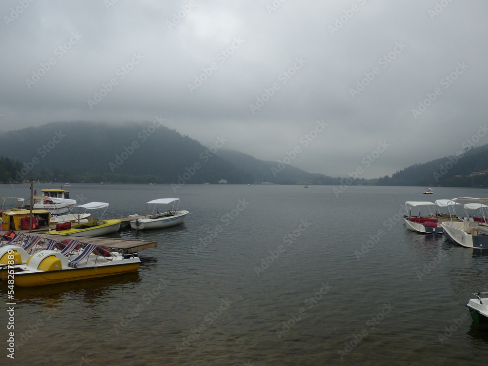 Fototapeta premium Gerardmer - August 2020 : Visit of the city of Gerardmer - Tour of the beautiful lake in the middle of the Vosges mountains with an August sunset 