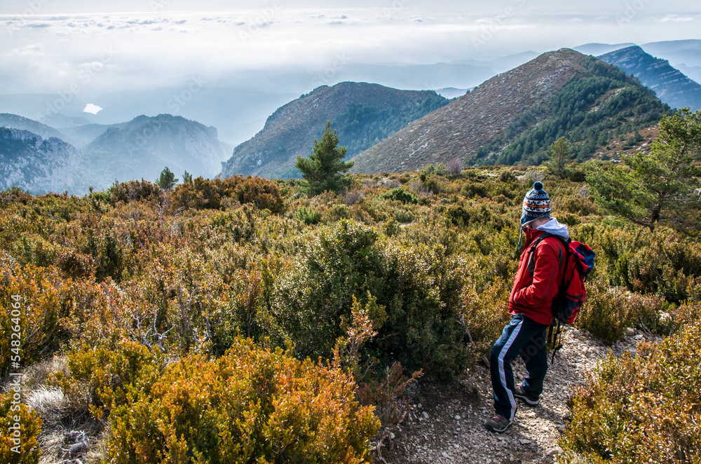 Man looking at the horizon from the peak of Guara