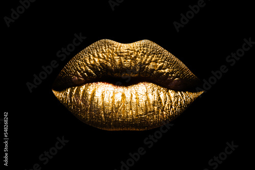 Fototapeta Golden lips isolated on black background Clipping path gild lips Luxury glamour art mouth