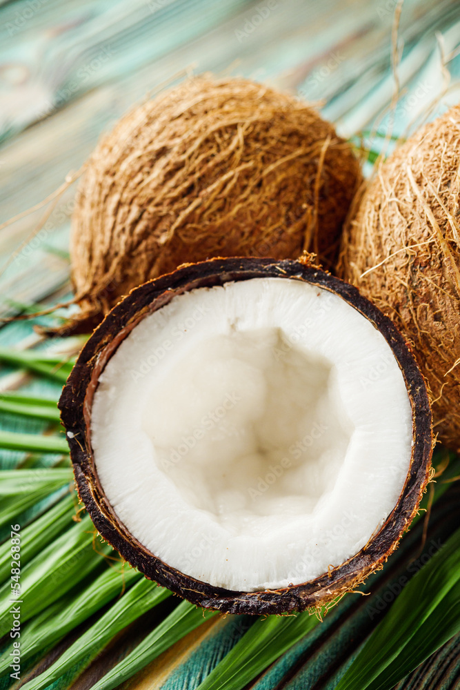 fresh natural coconut on rustik wooden background fresh natural coconut on rustik wooden background