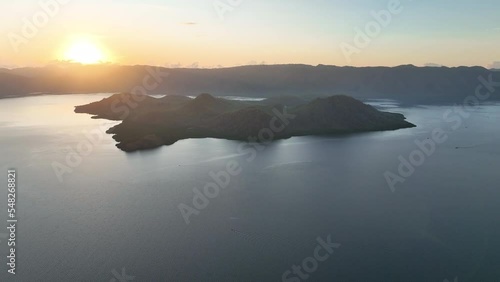 A tranquil sunrise illuminates the beautiful island of Lembata, among the Lesser Sunda Islands of Indonesia. This area is known for its incredibly high marine biodiversity. photo
