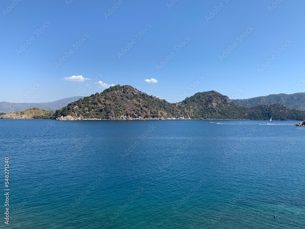 View rocks. Summer landscape, sea and mountain. Sea view. Landscapes of Turkey city Marmaris. View of a paradise sea, clear water.