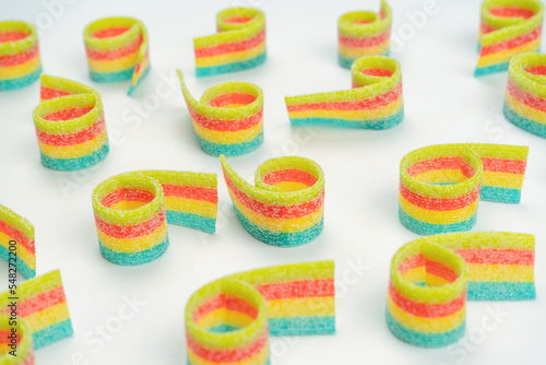 Assorted colorful gummy candies. Top view. Jelly donuts. Jelly bears. Isolated on a white background.