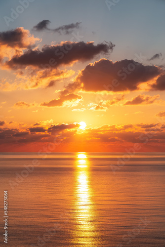 Dramatic Colorful Sunset Sky over Mediterranean Sea. Clouds with Sunrays. Cloudscape Nature Background. © edb3_16