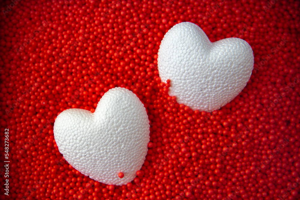 Fototapeta premium red hearts on a red background