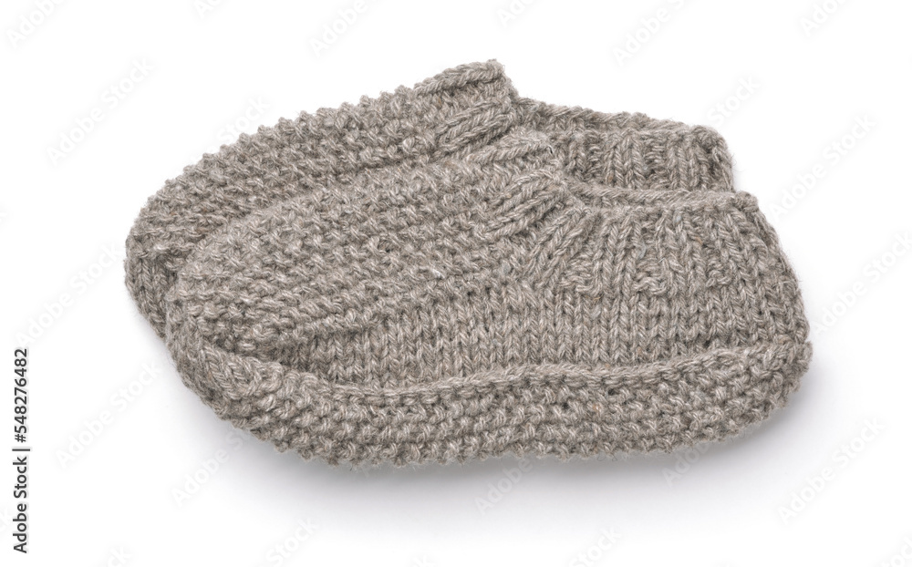 Side view of gray hand knitted wool slipper socks Side view of gray hand knitted wool slipper socks