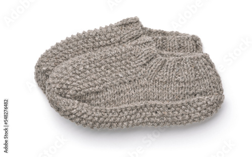 Side view of gray hand knitted wool slipper socks