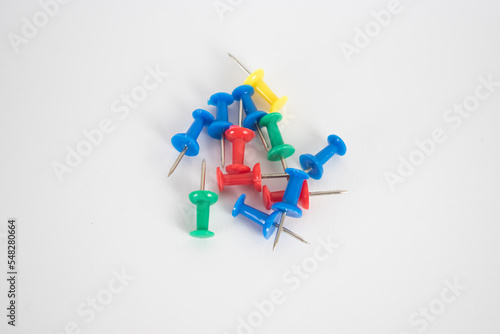 Thumbtack pushpin close up white background 