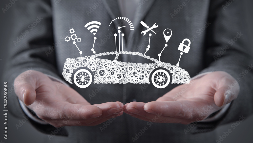 Modern smart car on male hand. Transportation. Technology Modern smart car on male hand. Transportation. Technology