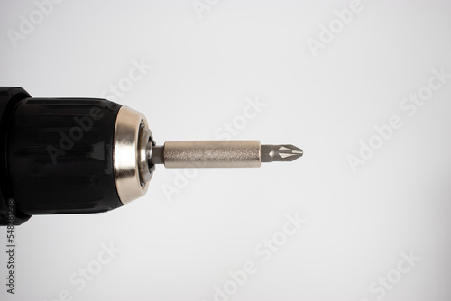 Electric drill machine white background close up 